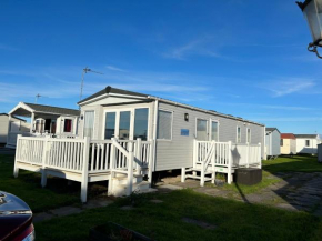 Beachcomber, A Modern caravan with CH and DG, Smart tv in every room and private broadband